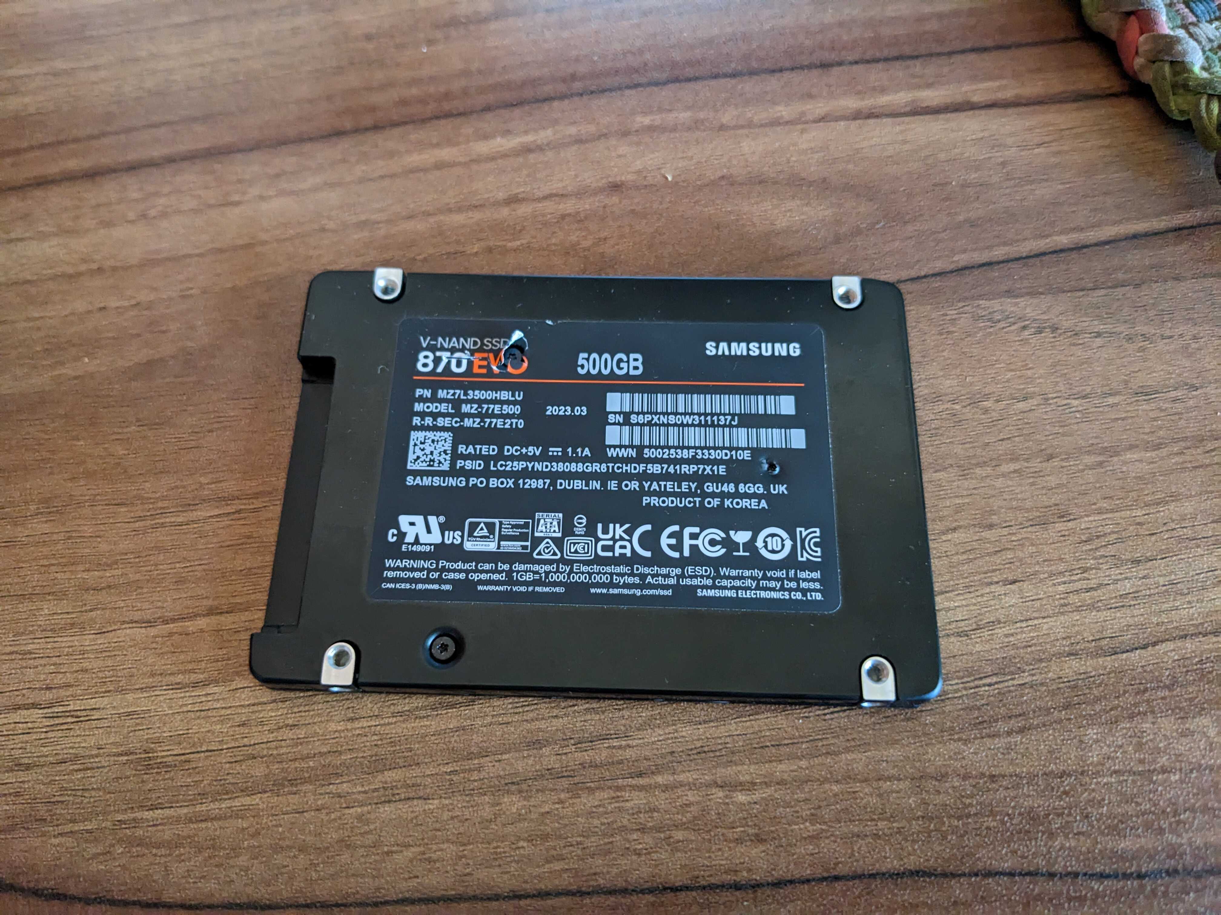 SSD board on top of its enclosure.