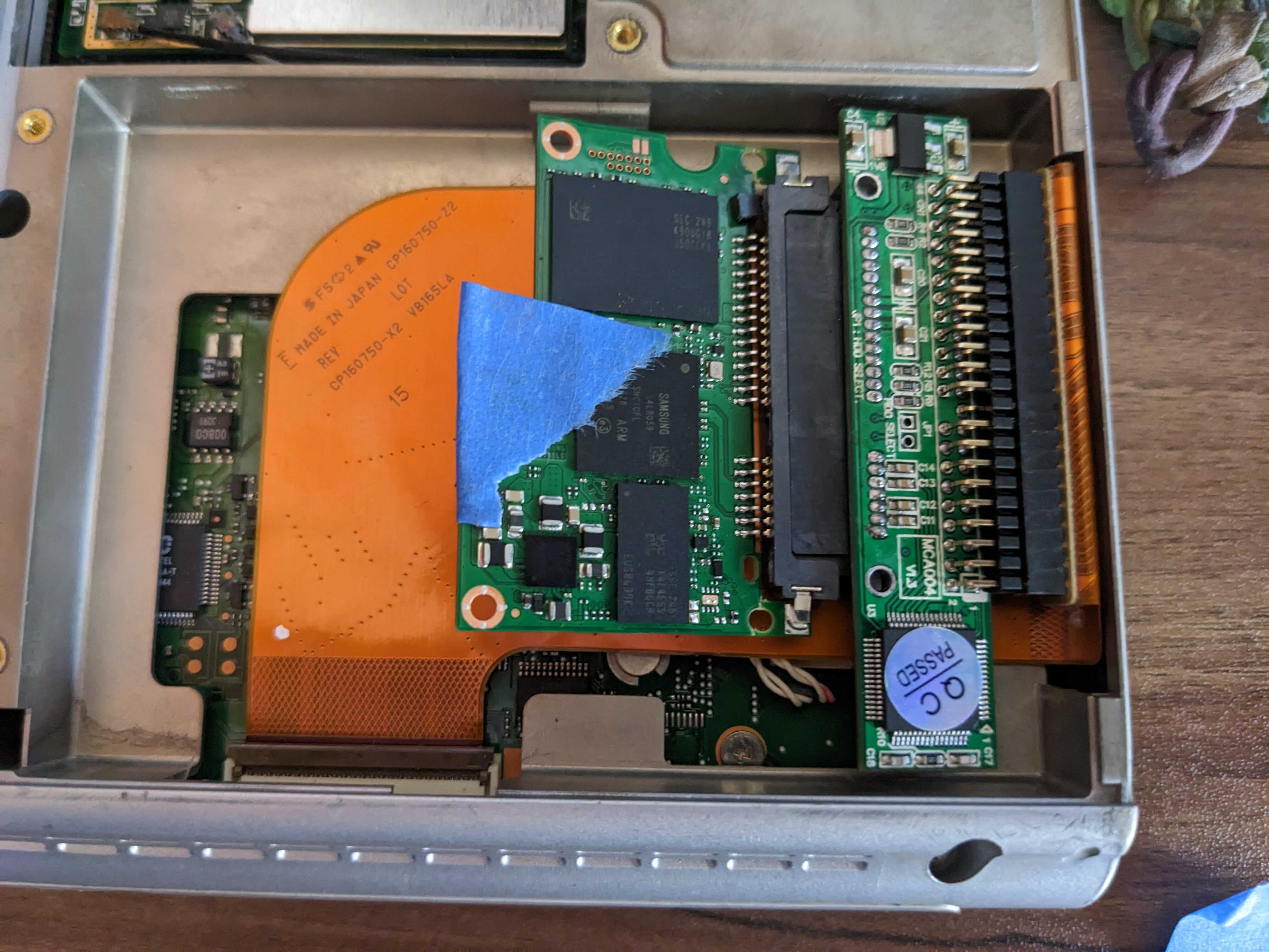 SSD inside of laptop's drive bay.